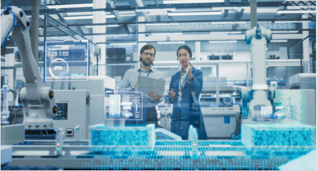 Two scientists looking at a machine